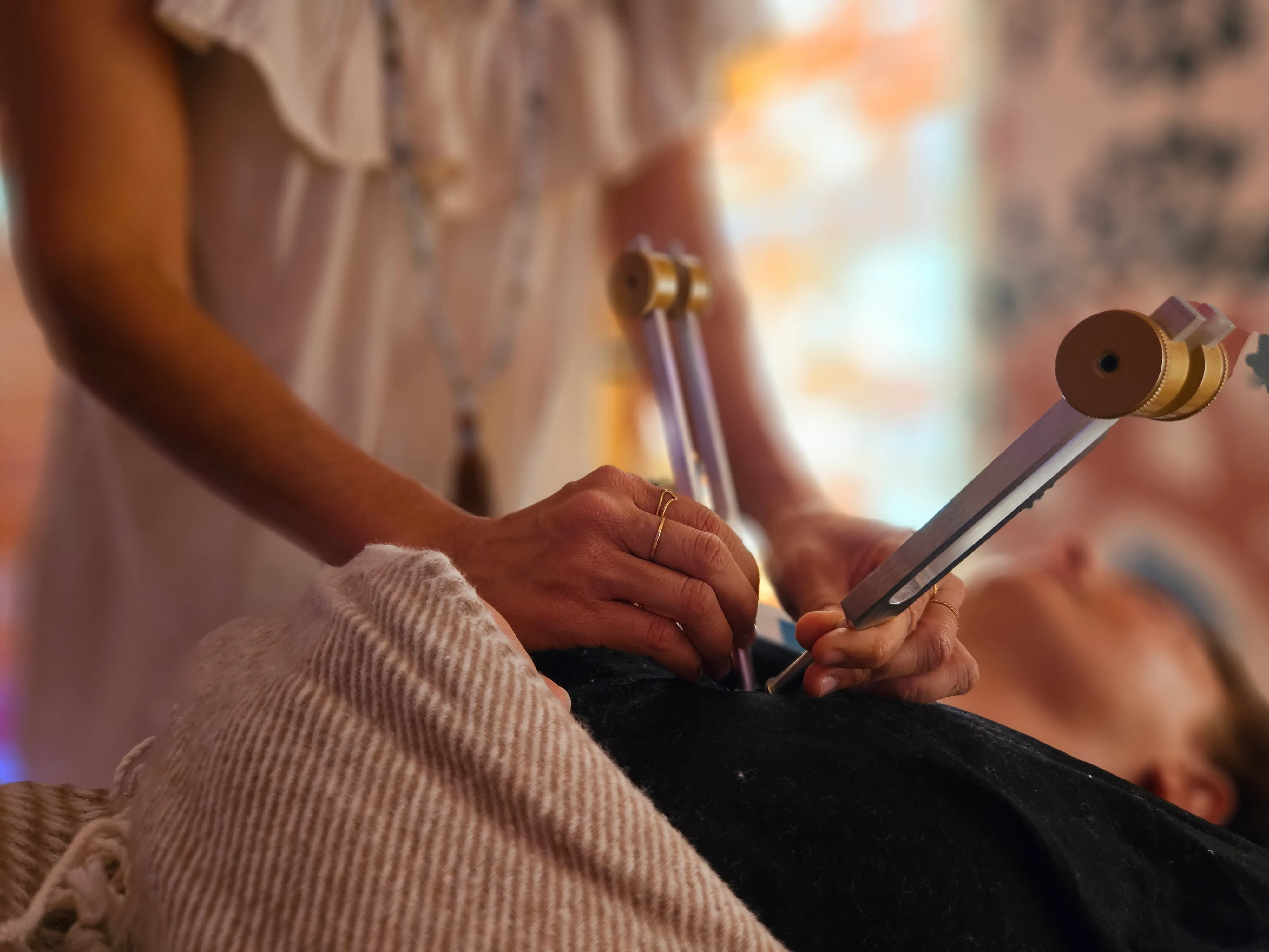 Tuning fork applied during an Acutonics® session